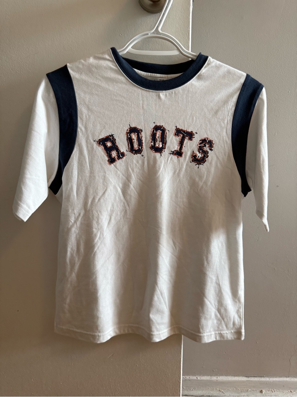 Roots White Tee with Navy Trim and Graphic Logo